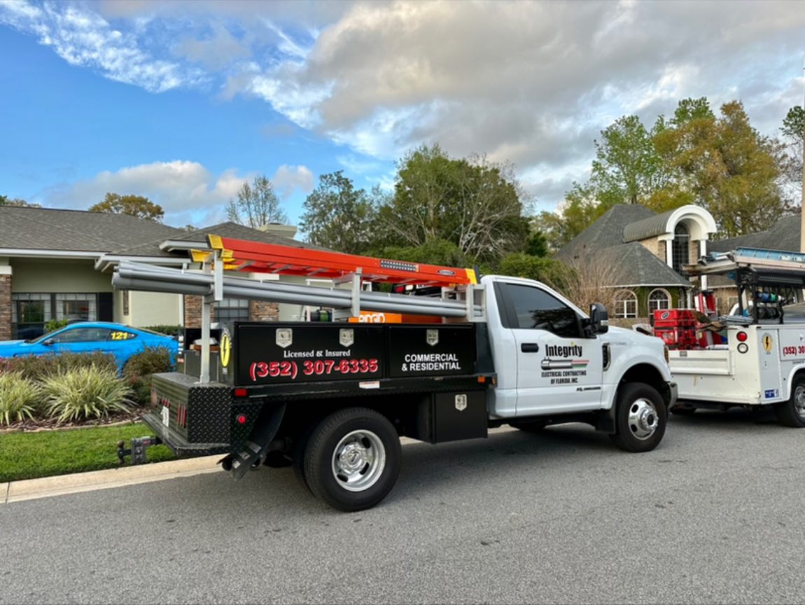 Integrity Electrical Contracting of Florida service truck marked Licensed & Insured, Commercial & Residential
